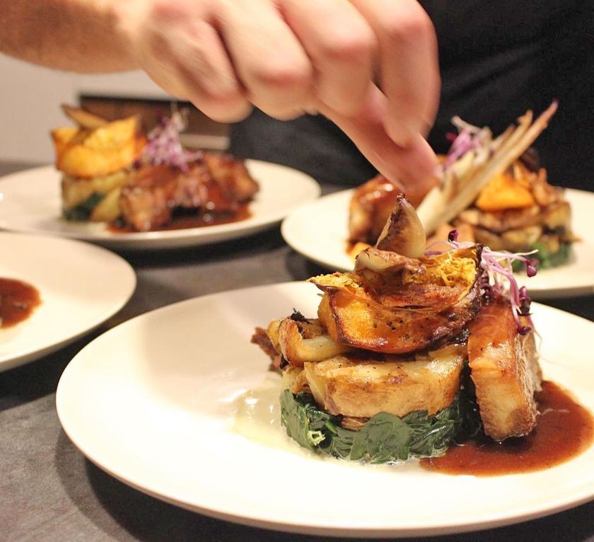 A chef plating a dish