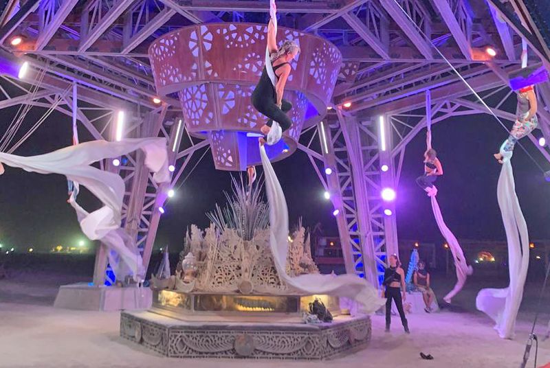 Aerial show on a rig under a chandelier