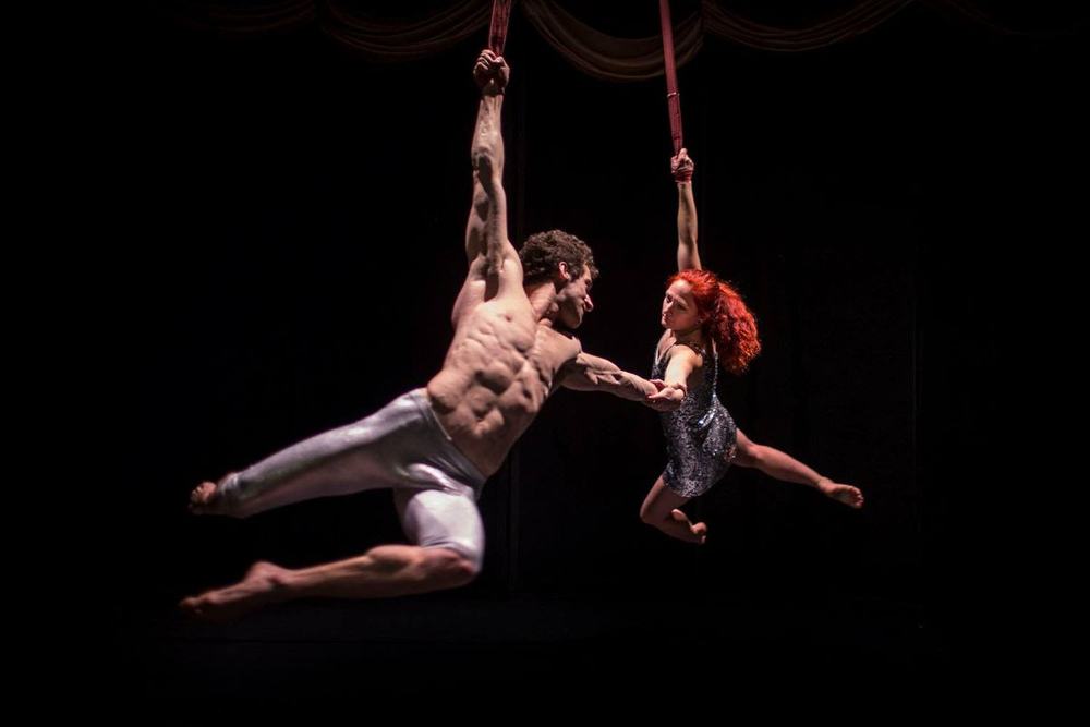 Aaron Koz on straps in a live performance