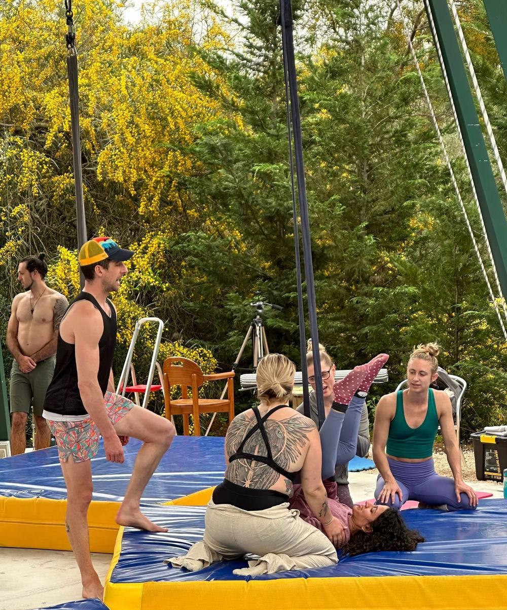Floor drills at the aerial straps retreat help build critical skills in the air