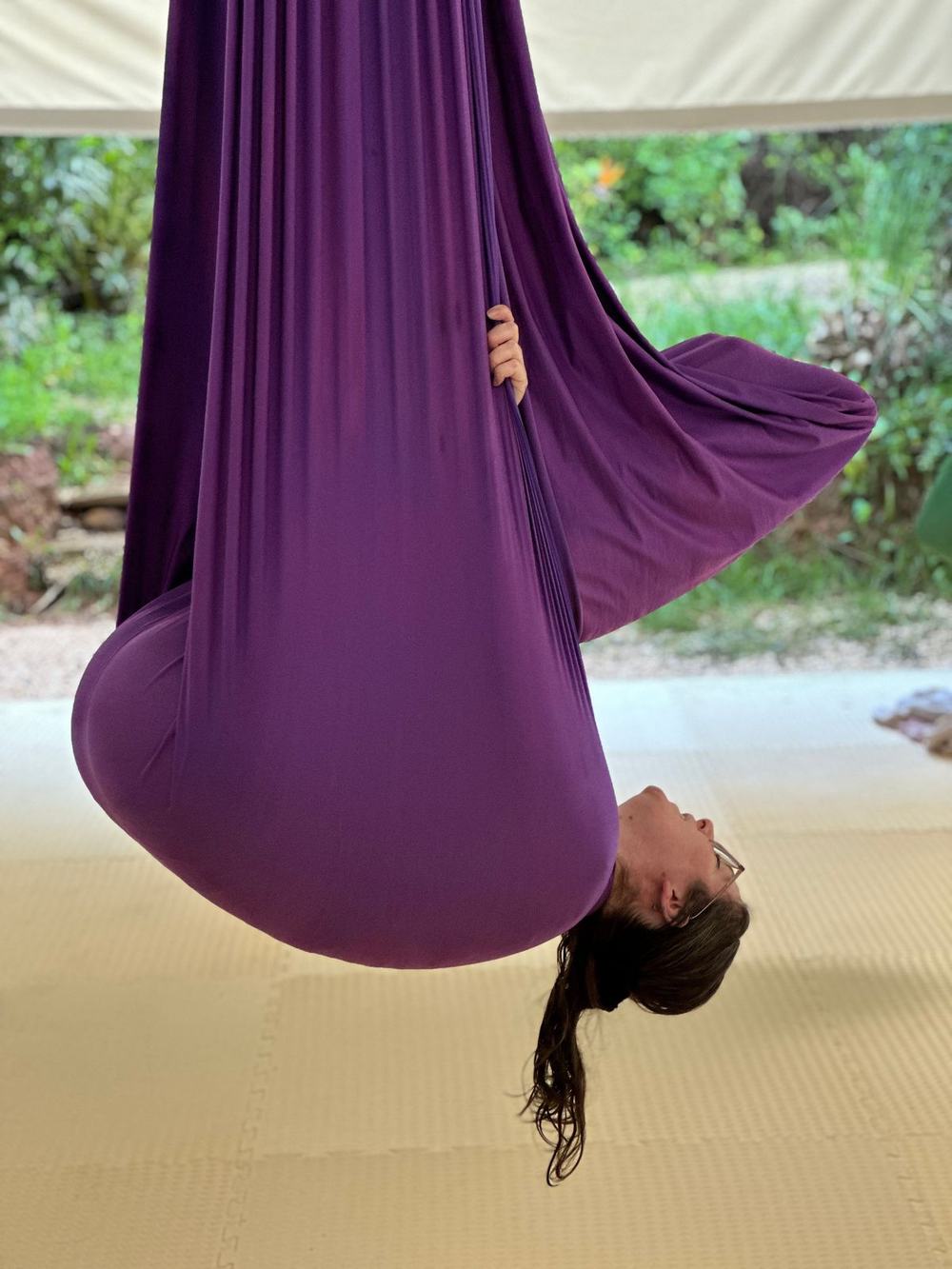 Aerial Yoga Benefits include spine decompression in inversion Photo Credit: Seyvion Collins @sirc909media