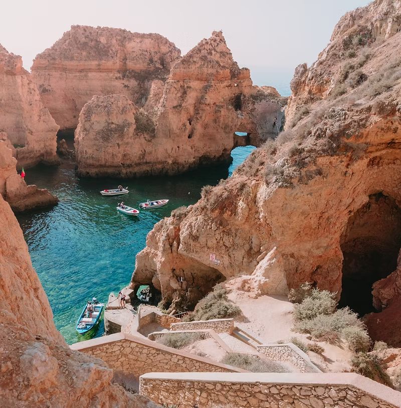 Boats in the turquoise coves below the Ponta da Piedade cliffs