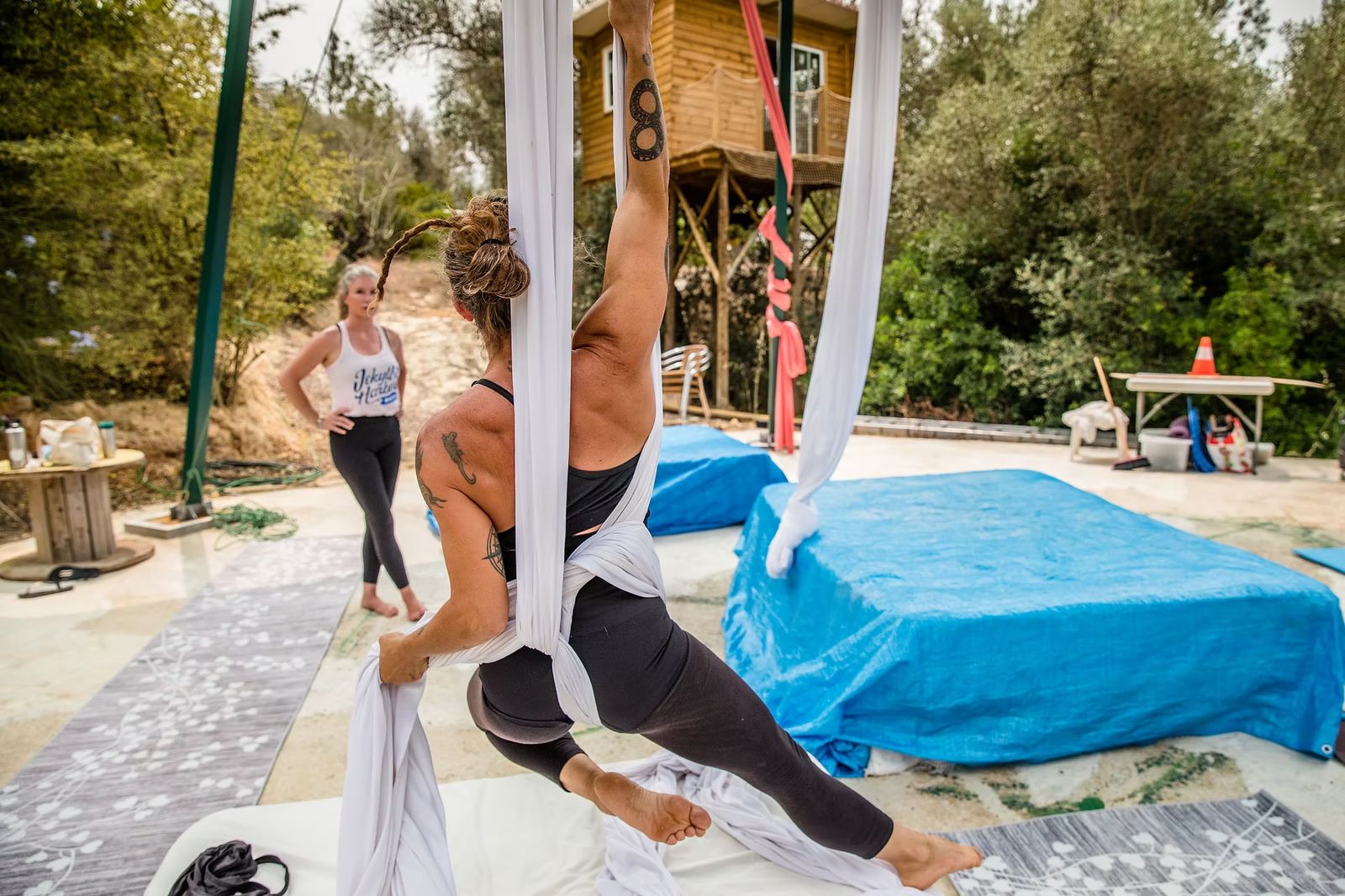 Training on silks in the open-air studio