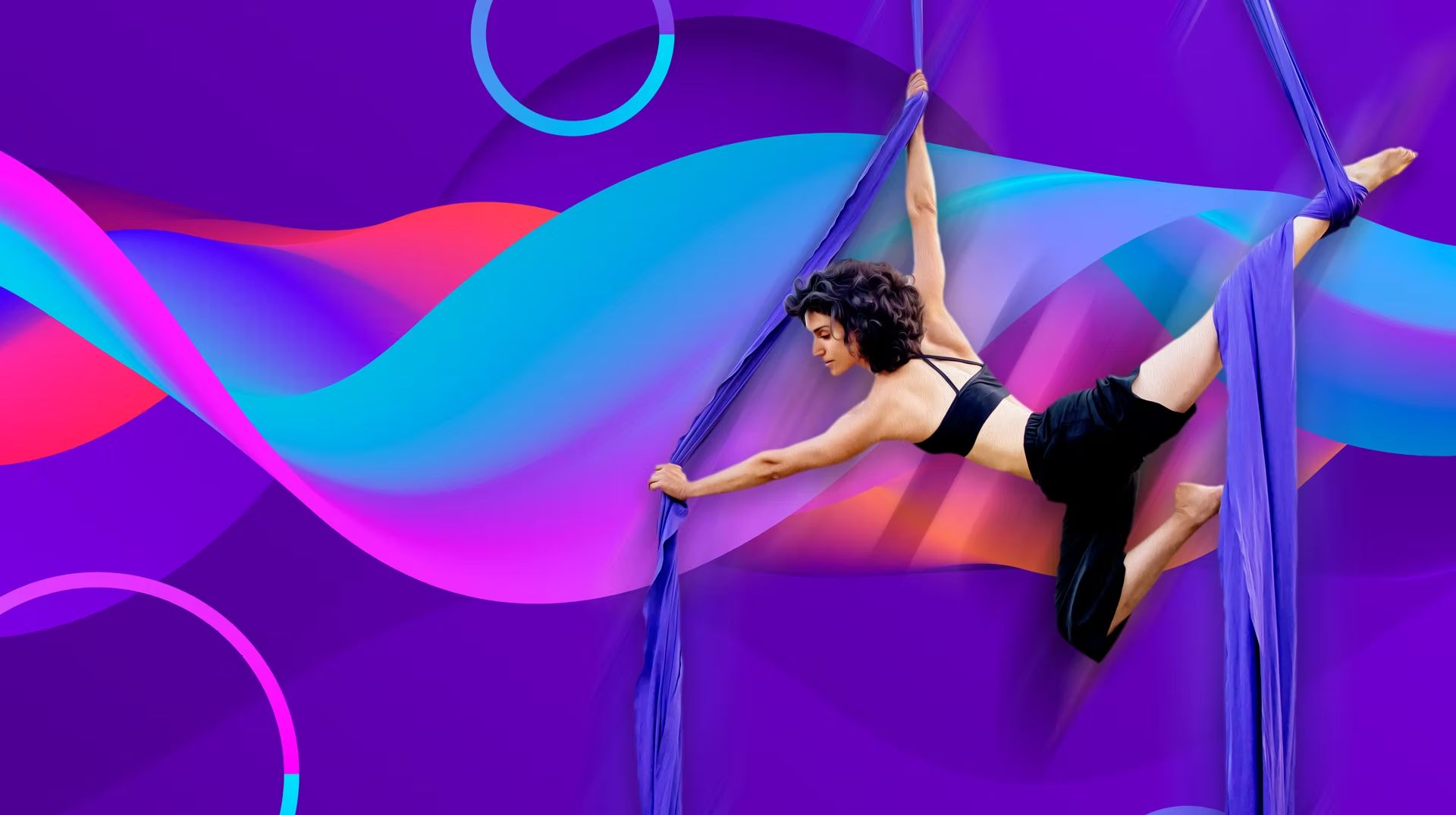 Rotem Sapir in a split on purple silks against a bright purple and pink background